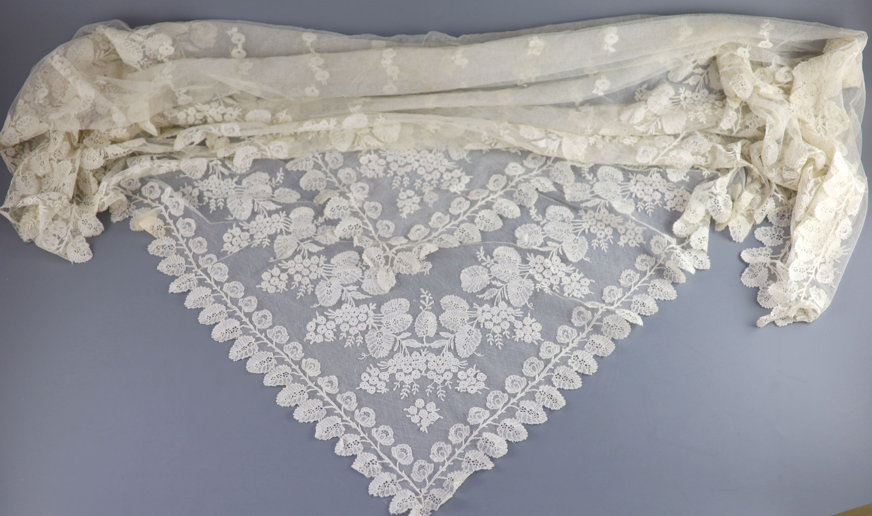 A fine 19th century bobbin lace Brussels christening veil, with letter of provenance and Ladies Society letter,